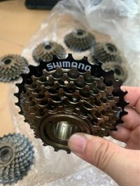 Líp 7 SHIMANO SIS - Líp vặn 7 tầng - đen vàng - TS 14 - 28T (chiếc)