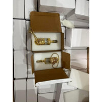 lọ thủy tinh rỗng màu vàng có dây đeo