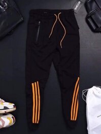 LOẠI TỐT - GIÁ SỈ QUẦN NỈ KHÓA TÚI BO CHÂN BA SỌC XƯƠNG CÁ , QUẦN JOGGER NAM NỮ THỂ THAO LƯNG DÂY RÚT - ĐEN XỌC CAM X.CÁ - FREE SIZE 45-62KG