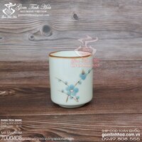 Ly cốc sứ không quai men kem vẽ hoa mai xanh