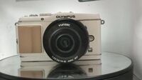 Máy ảnh Olympus PEN E-P3 kèm len 14-42 đa ngôn ngữ