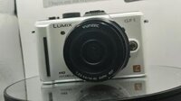 Máy ảnh Panasonic Lumix GF1 kèm len 14-42 tiếng anh