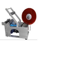 Máy dán nhãn hủ nhựa có đóng date Mt50, máy dán nhãn chai lọ mỹ phẩm hủ yến, hủ nhựa pet duy tân