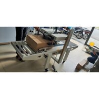 Máy dán thùng, máy dán băng keo thùng mặt trên mặt dưới, máy dán thùng bán tự động FXA6050