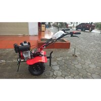 MÁY XỚI ĐẤT CHẠY DẦU KAMASTSU 950SH CHUYỂN HƯỚNG