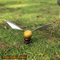 Mô Hình Trái Banh Golden Snitch TẶNG kèm 1 cuốn Harry Potter Golden Snitch Sticker Book