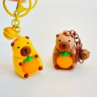 Móc Khóa Chuột Capybara Ôm Cam Có Đèn
