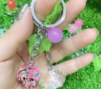 MÓC KHÓA HEO THỦY TINH TRONG SUỐT