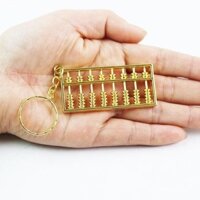 Móc khóa hợp kim bàn tính vàng mini, bút treo, mặt dây chuyền Ruyi, bàn tính nhỏ, trang trí sinh nhật cho trẻ em