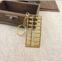 Móc khóa vàng bàn tính tiền phong thủy may mắn tiền tài VHMART57