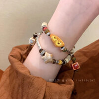 Mới Phong Cách Trung Quốc Gốm Ngôi Sao Vòng Tay Nữ Ánh Sáng Sang Trọng Tua Rua Dây Rút Vòng Tay