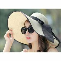 Mũ cói vành rộng đính nơ to.