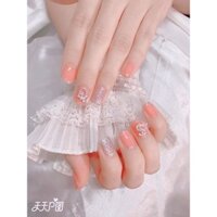 nail thạch hồng nhẹ đính charm đá