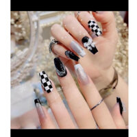 Nailbox móng giả thiết kế úp tay sơn gel màu đen trắng và nhũ  tráng gương viền nổi gắn nơ