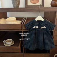 (ODQC/Size nhỡ) Quần áo trẻ em, váy cho bé gái, dáng váy babydoll xếp ly giữa họ tiết kẻ xanh than đính nơ xinh 2 bên