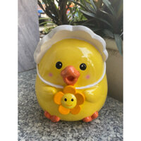 ống heo tiết kiệm gà cầm hoa