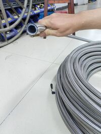 ỐNG TEFLON BỌC LƯỚI INOX 3/16 INCH - 5MM DÀI 100M