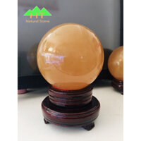 Quả cầu phong thủy đá Canxit màu vàng nâu mật ong mịn đẹp đường kính 10,5 - 11cm nặng 1,5 - 1,7 kg