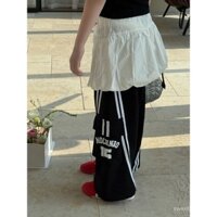 Quần áo trẻ em 2025 Quần Yếm Màu Đen mùa hè quần ống rộng cho bé trai và bé gái phong cách mát mẻ Quần âu kẻ sọc đường phố cao kiểu Mỹ