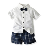 Quần Áo Trẻ Em Phong Cách Nhật Bản Quần Áo Trẻ Em Mùa Hè Áo Sơ Mi Trắng Tay Ngắn Kẻ Sọc Yếm Quần Short Nơ Hai Mảnh Phù Hợp Với
