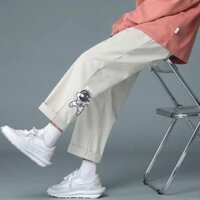 Quần dài ống rộng kaki unisex quần baggy in hình nasa chất liệu mềm mại phong cách thể thao 3 màu cá tính. QS
