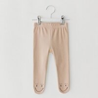 Quần legging phủ chân màu da người hình mặt cười giữ ấm cho bé