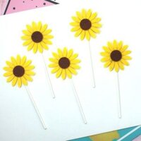 Que cắm hoa hướng dương nhiều màu trang trí bánh kem