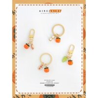 Quyến rũ dễ thương, móc khóa hạt đậu hình quả hồng, túi AirPods, USB flash drive, phụ kiện trang trí treo xe chống thất lạc