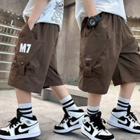【Ready Stock】 Boys' Workwear Shorts Summer 2025 New Medium and Large Children's Summer Clothing Thin Casual Cropped Pants Loose Track Pants 4o52