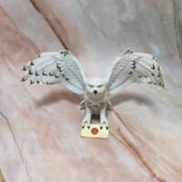 Sản phẩm còn hàng Anime figurines Harry Potter figurineĐồ trang trí búp bê mô hình chim cú ma thuật Harry Potter Hedvi chính hãng