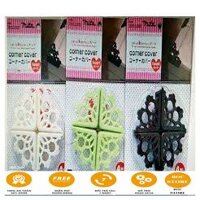 Sét 4 cái bịt góc bàn hoa văn Com Bo 10 Cái