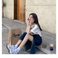 Set áo pull trắng chân váy jean xẻ đùi