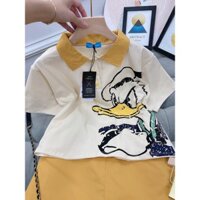 Set áo thun cổ bẻ vịt vàng chân váy kaki chữ A