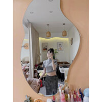 Set áo thun crotop kèm chân váy dài xẻ tà