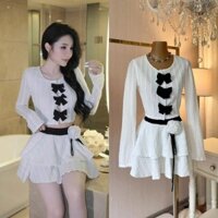 Set áo thun ren cổ tròn đính nơ và chân váy ngắn dáng xòe mini có lót có kèm bông xinh xắn