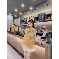 Set áo vàng chấm bi nơ cổ mix quần kem