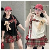 Set váy áo tăm tay ngắn cổ tròn có sọc nơ caro đỏ phối chân váy kaki caro xếp ly kèm gấy nhỏ năng động đáng iu cho nàng
