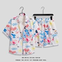 Size M-4XL. Thời trang mùa hè dáng rộng manga Hàn Quốc họa tiết graffiti retro giản dị phim hoạt hình Thái Lan quần short thẳng + áo sơ mi ngắn tay nam Hawaii bãi biển phù hợp với