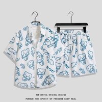 Size M-4XL. Thời trang mùa hè mới dáng rộng phiên bản Hàn Quốc hoạt hình vui nhộn họa tiết mèo Quần short thẳng hoa Thái Lan + áo sơ mi ngắn tay nam Hawaii phù hợp với bộ đồ thường ngày