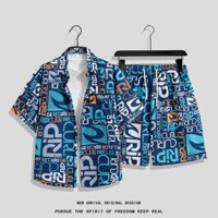 Size M-4XL. Thời trang mùa hè mới dáng rộng phiên bản Hàn Quốc in đầy đủ chữ hoạt hình Quần short thẳng Thái Lan + áo sơ mi ngắn tay nam giản dị Bộ đồ đi biển Hawaii