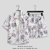 Size M-4XL. Thời trang mùa hè mới dáng rộng Hàn Quốc họa tiết gấu hoạt hình Áo sơ mi ngắn tay cổ điển Thái Lan + quần short thẳng nam Hawaii đi biển thường ngày phù hợp với