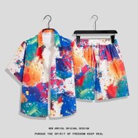 Size M-4XL. Thời trang mùa hè mới dáng rộng phiên bản Hàn Quốc đầy màu sắc họa tiết bắn tung tóe quần short thẳng hoa Thái Lan + áo sơ mi ngắn tay nam thường ngày Bộ đồ đi biển Hawaii