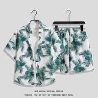 Size M-4XL. Thời trang mùa hè mới dáng rộng phiên bản Hàn Quốc của hoa văn lá cây Quần short thẳng Thái Lan + áo sơ mi ngắn tay Bộ đồ nam giản dị Hawaii