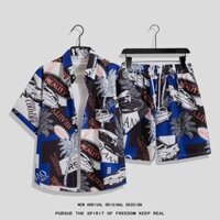 Size M-4XL. Thời trang mùa hè mới dáng rộng phiên bản Hàn Quốc in đầy đủ hoạt hình quần short thẳng + Áo sơ mi ngắn tay cổ điển Thái Lan nam Hawaii đi biển thường ngày phù hợp với