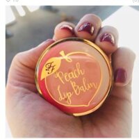 Son duong Too Faced Peach Lip Balm.