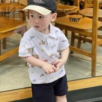 [TABY] Set polo in tràn viền gấu nâu ô tô, chất liệu cotton co giãn phối quần kaki lưng thun cho bé trai 8-23kg JNAB256