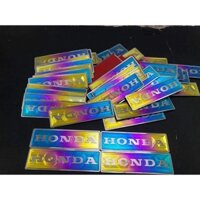 tem titanium rổ wave thái có sẵn kem 3M dán ( 2 miếng )