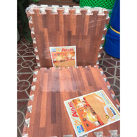 Thảm Xốp ghép vân gỗ ÂU LẠC 42x42(1 bich 9 miếng)