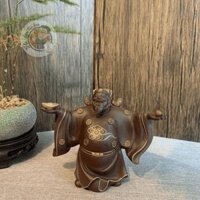 Thần tài tử sa dang tay