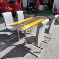 Thanh lý bộ bàn ăn 4 ghế inox mặt kính sang trọng hiện đại